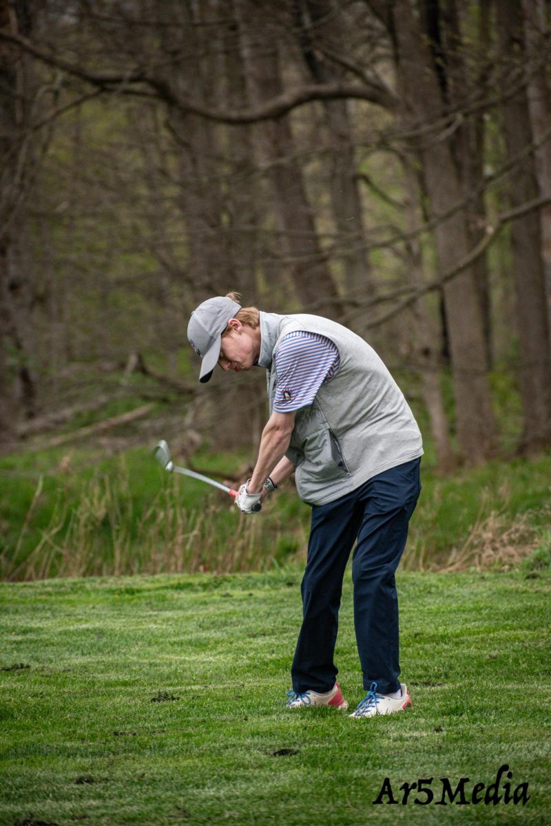 Senior Cutter Kreikmeier teeing off in a match against Morristown 