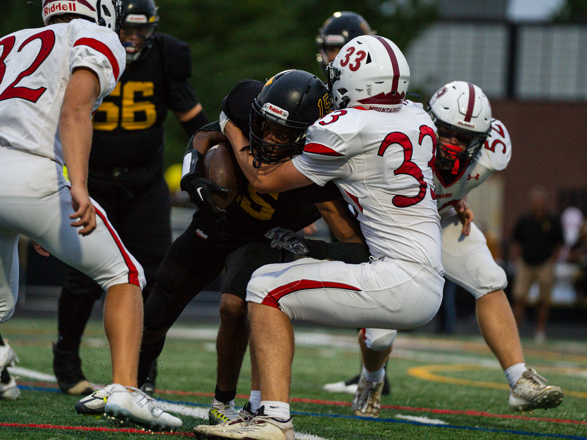 Junior Teagun Hartnett making finishing up a tackle for a loss  against Monmouth 