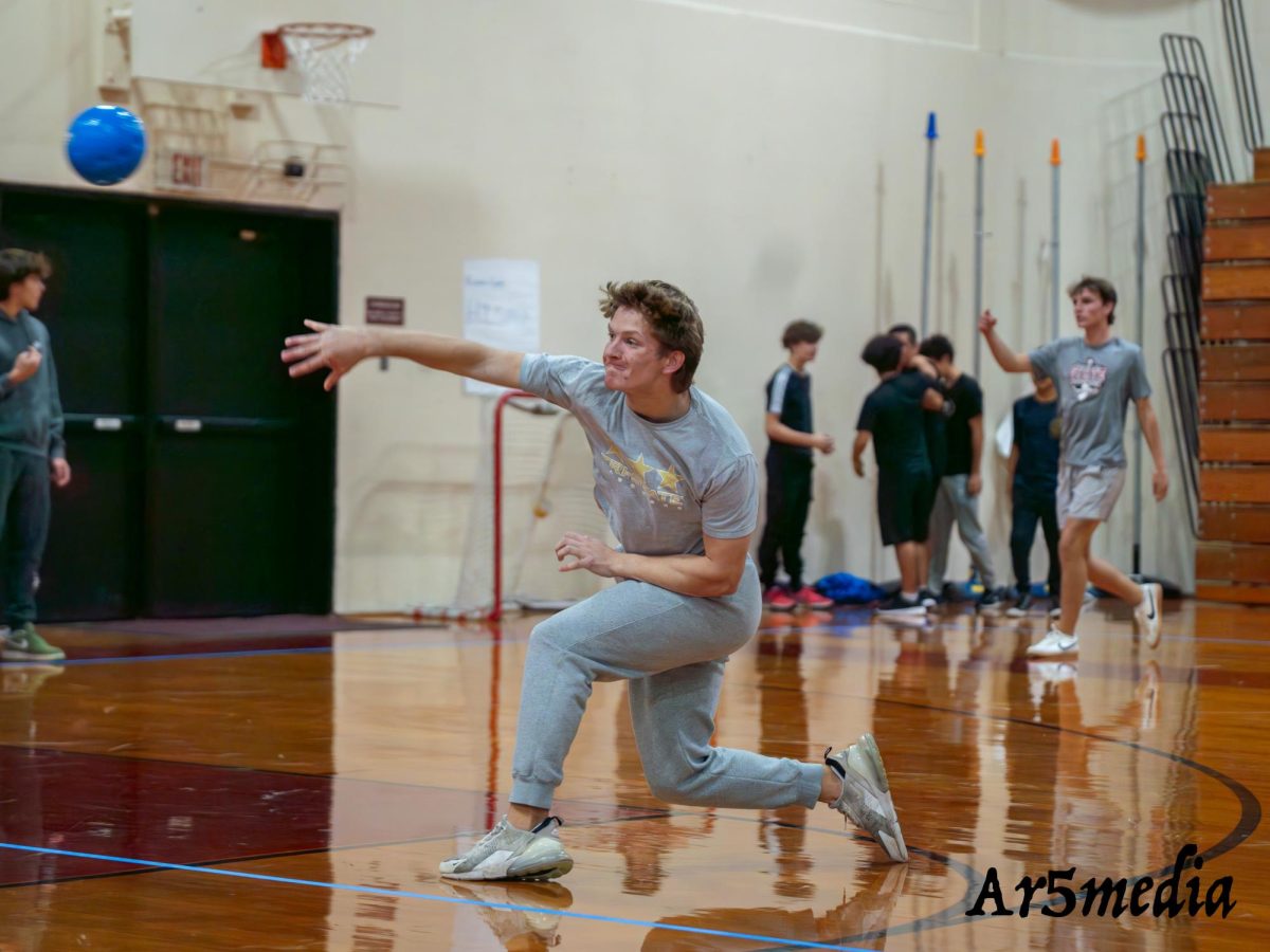 Logan Stevens '26 firing a dodgeball at the opposition during the tournament