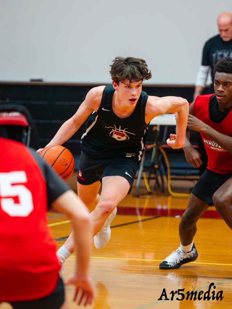 Sophomore Marshall Douglass dribbling the ball during a scrimmage against Newark Academy 